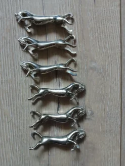 6 porte couteaux en métal argenté