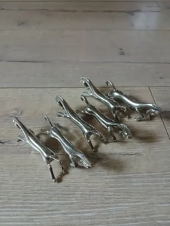6 porte couteaux en métal argenté