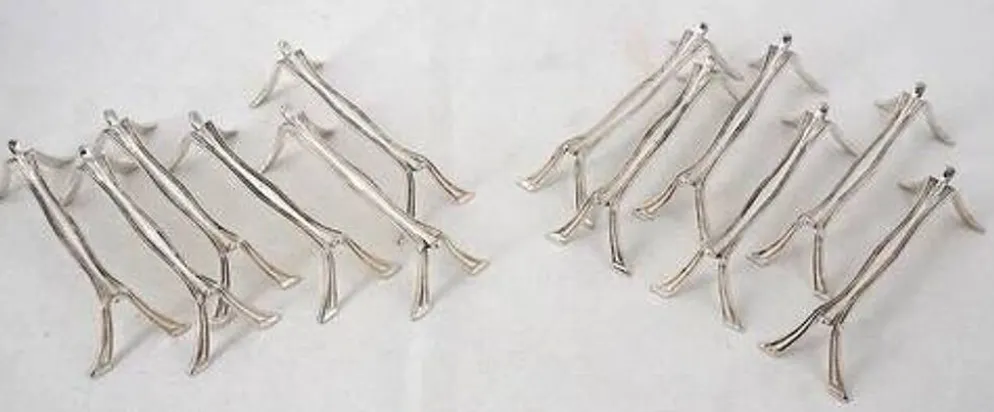 12 porte-couteaux en métal argenté Christofle modèle Printania, Art Nouveau