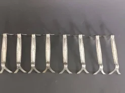 8 porte-couteaux en métal argenté, décor de palmettes, WMF 1880
