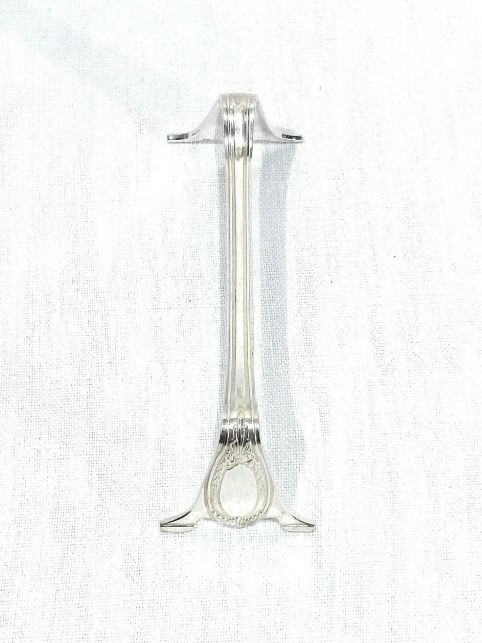 12 porte-couteaux en métal argenté style empire