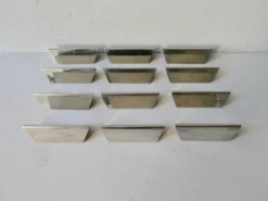 12 porte couteaux en métal chromé