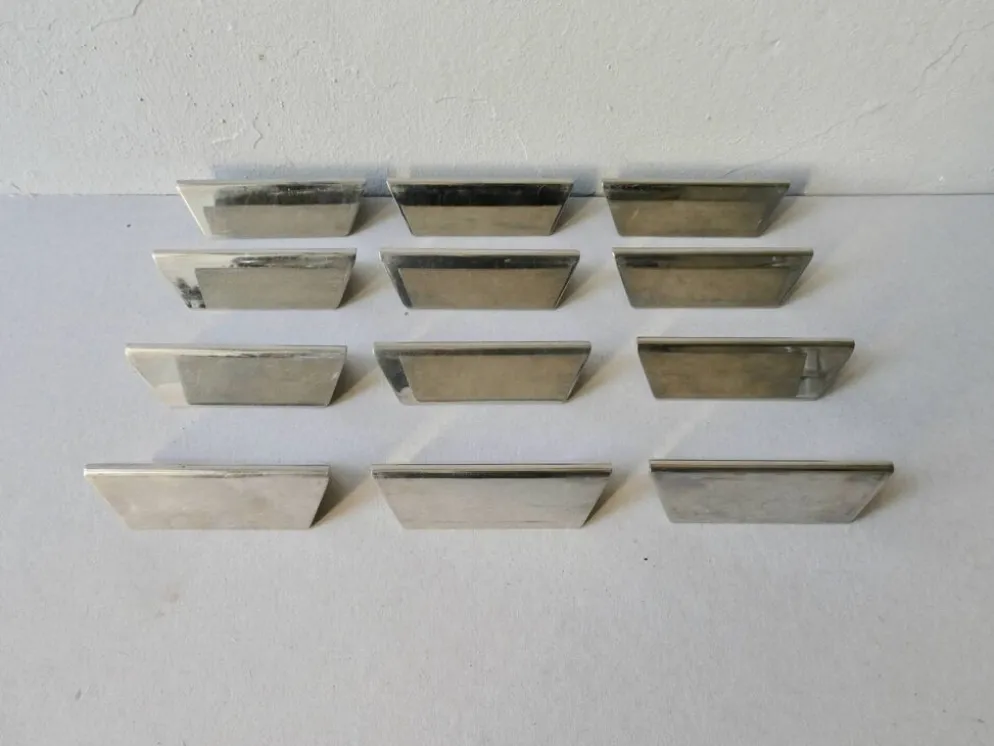 12 porte couteaux en métal chromé
