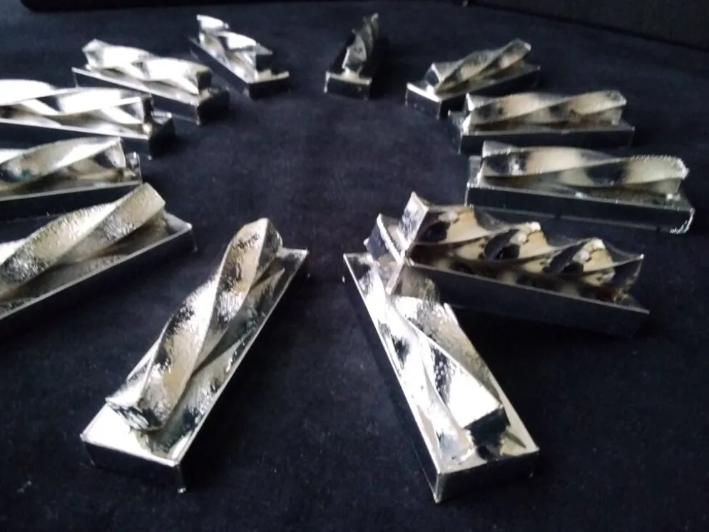 12 Porte couteaux en métal couleur argent