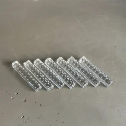7 porte-couteaux en verre moulé