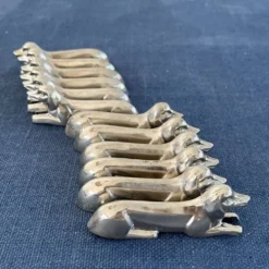 12 porte-couteaux teckel en métal