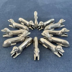 12 porte-couteaux teckel en métal