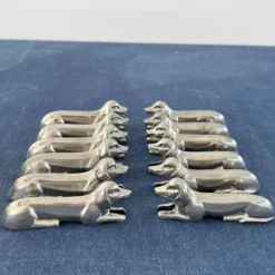 12 porte-couteaux teckel en métal