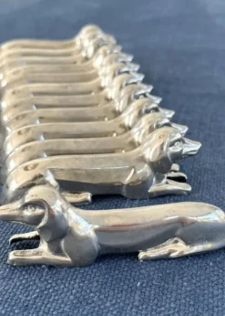 12 porte-couteaux teckel en métal