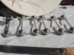 porte couteux escargot métal argenté