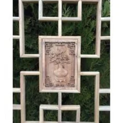 Porte en bois sculptée - De claustra à portes coulissantes.