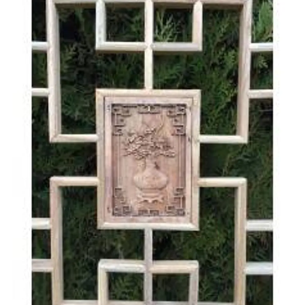 Porte en bois sculptée - De claustra à portes coulissantes.