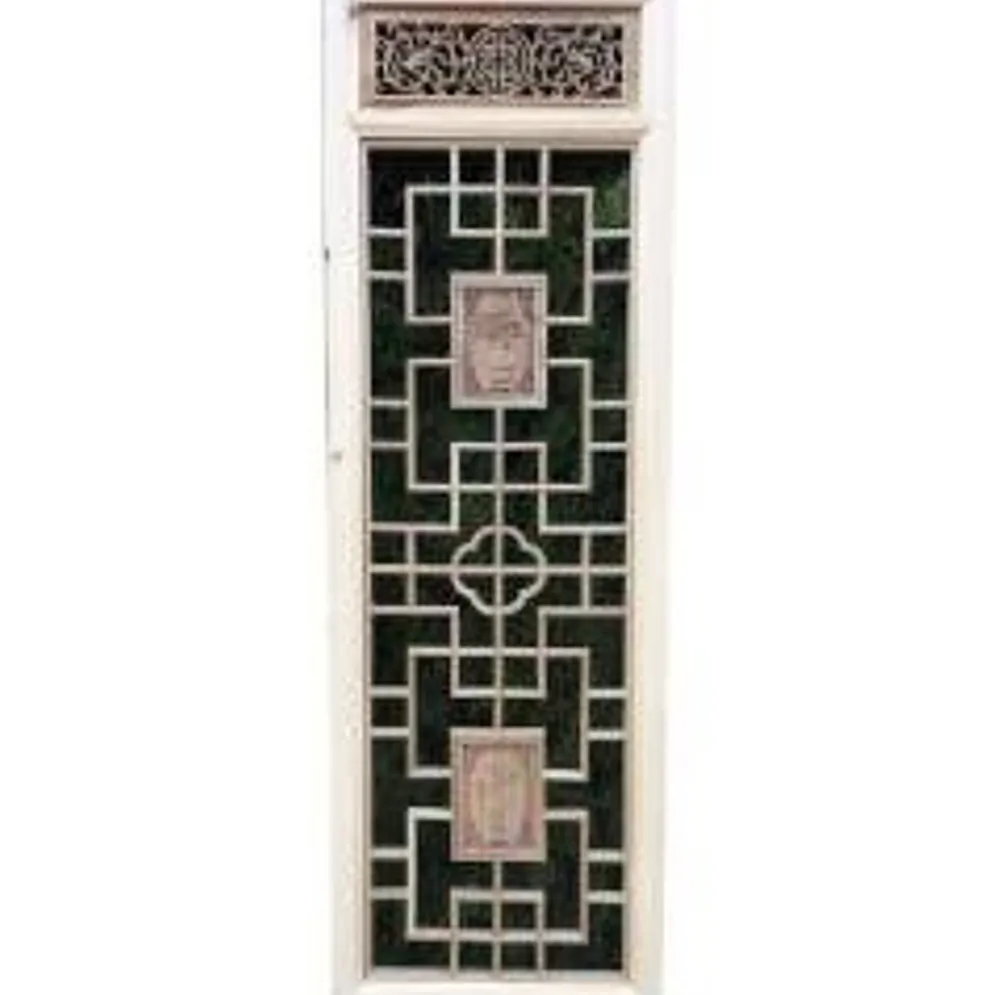 Porte en bois sculptée - De claustra à portes coulissantes.