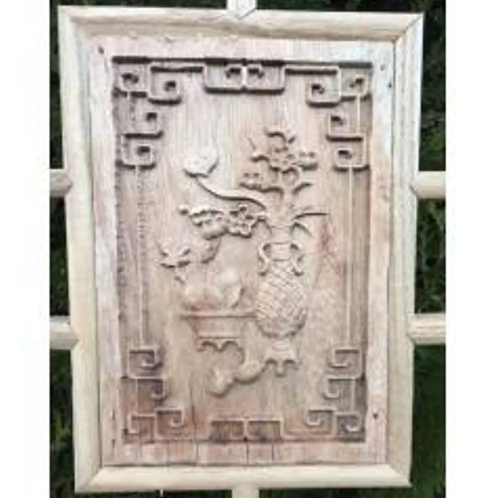 Porte en bois sculptée - De claustra à portes coulissantes.
