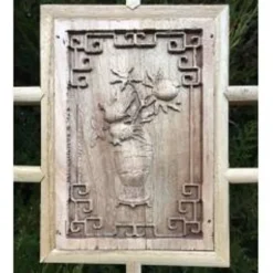 Porte en bois sculptée - De claustra à portes coulissantes.