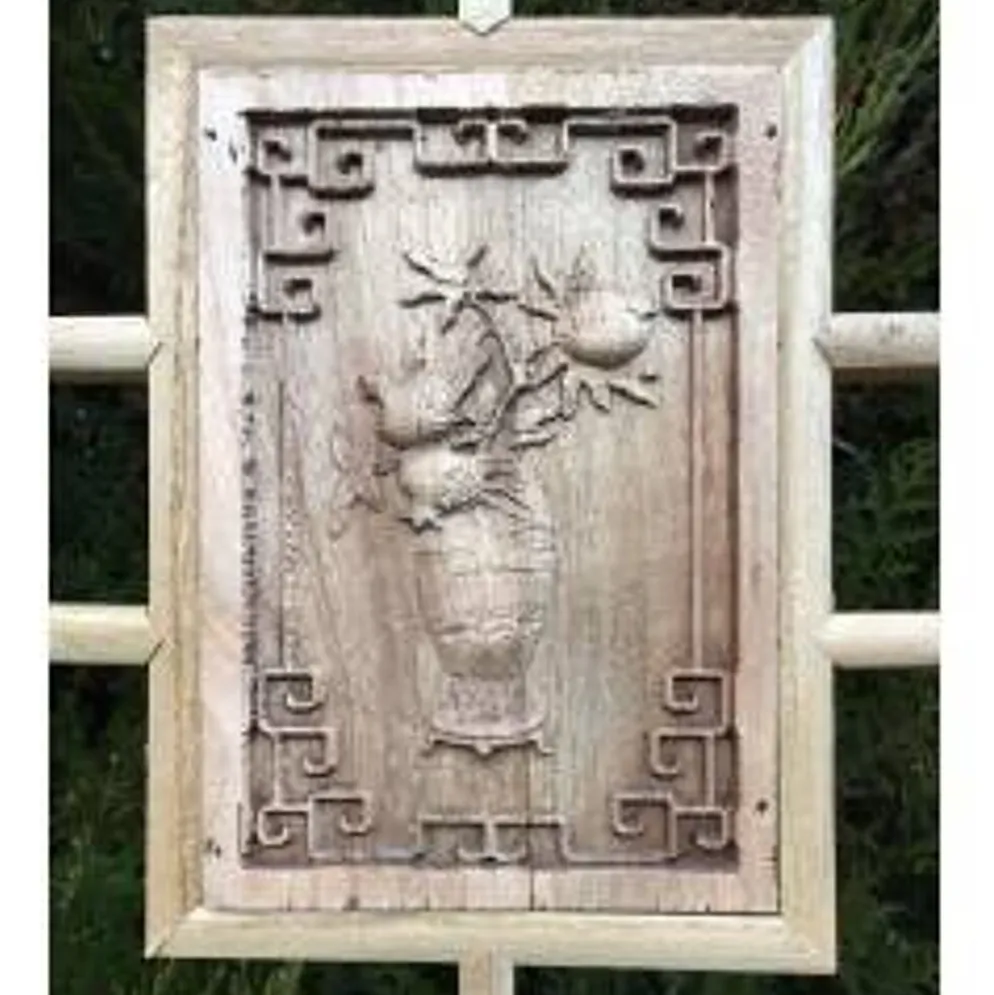 Porte en bois sculptée - De claustra à portes coulissantes.