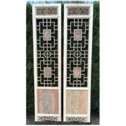Porte en bois sculptée - De claustra à portes coulissantes.