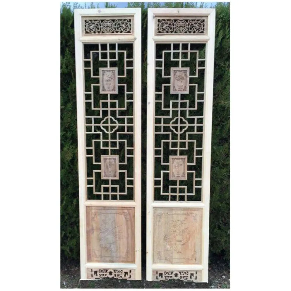 Porte en bois sculptée - De claustra à portes coulissantes.