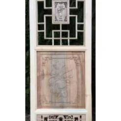 Porte en bois sculptée - De claustra à portes coulissantes.