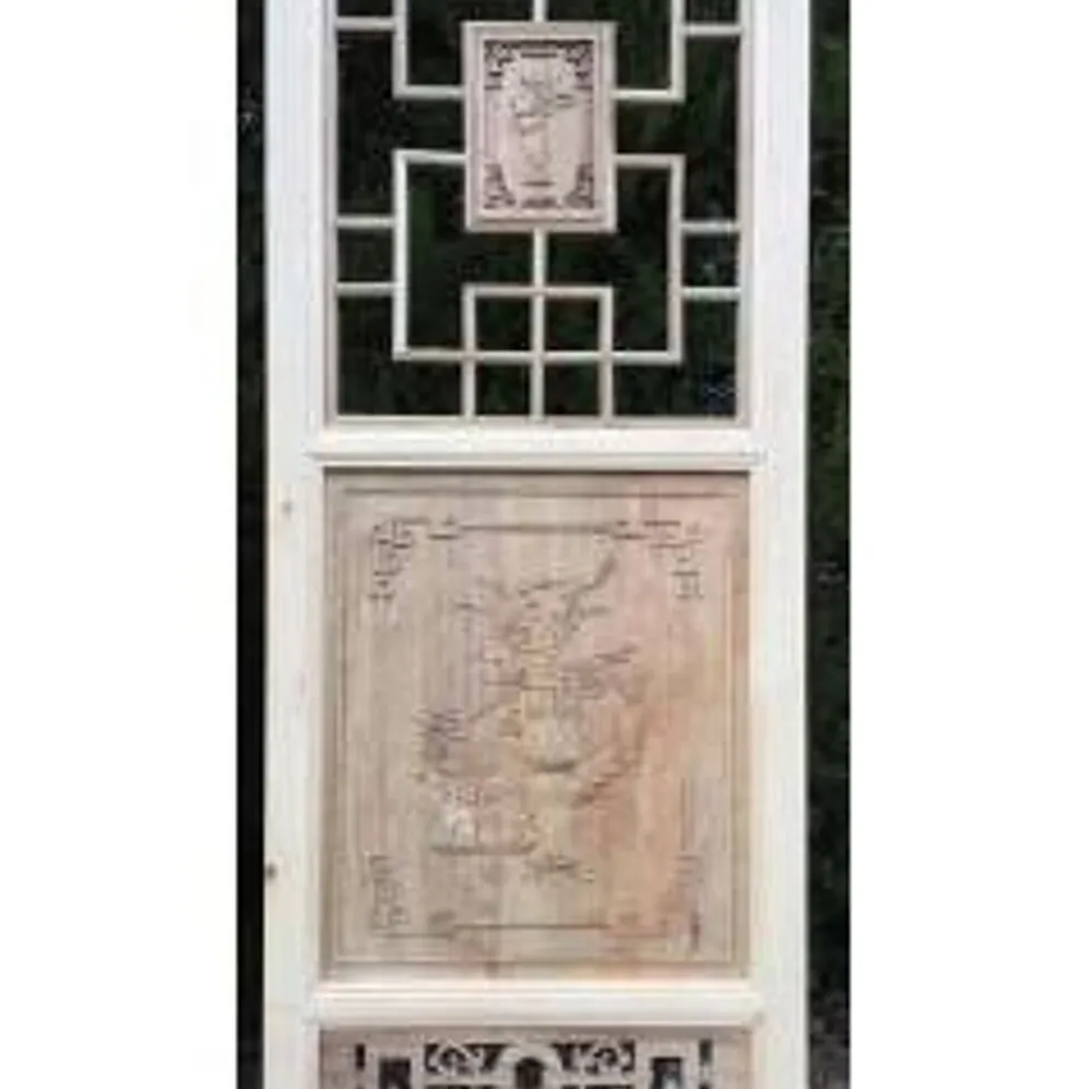 Porte en bois sculptée - De claustra à portes coulissantes.
