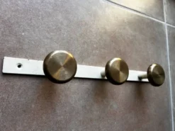 Portemanteau ancien en laiton et métal peint