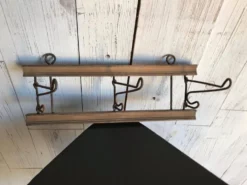 Porte-manteau mural antique en bois et fer marron, vers 1900, crochets pliants