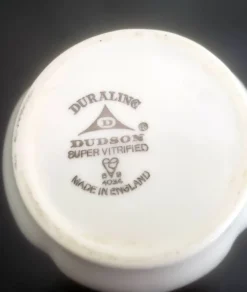 Pot à lait avec soucoupe