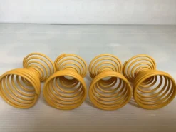 Quatre coquetiers ressort spirale jaune
