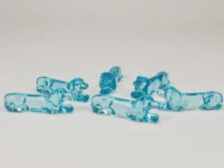 6 repose-couteaux Art déco français en verre bleu clair, années 1930 représentant un teckel ou basset