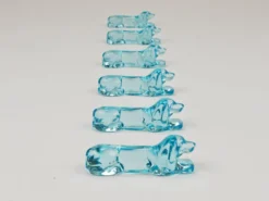6 repose-couteaux Art déco français en verre bleu clair, années 1930 représentant un teckel ou basset