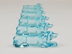 6 repose-couteaux Art déco français en verre bleu clair, années 1930 représentant un teckel ou basset