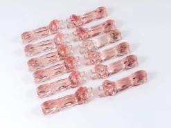 12 Repose-couteaux Chien Teckel Basset Art Déco Français en Verre Rosé, France, Années 1930