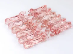 12 Repose-couteaux Chien Teckel Basset Art Déco Français en Verre Rosé, France, Années 1930