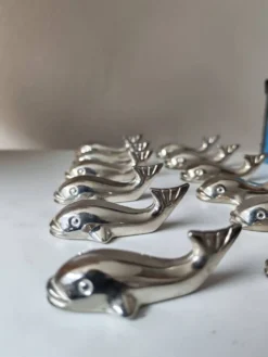 12 reposes-couteau en métal argenté baleine