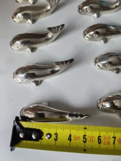 12 reposes-couteau en métal argenté baleine