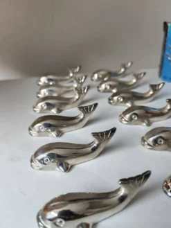 12 reposes-couteau en métal argenté baleine