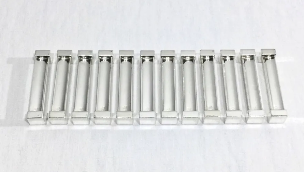 Saint Médard – 12 porte couteaux en métal argenté