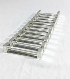 Saint Médard – 12 porte couteaux en métal argenté
