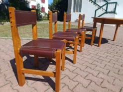 Salle a manger brutaliste en orme et cuir