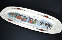 Sarreguemines grand plat ovale Obernai la bataille de boule de neige H. Loux