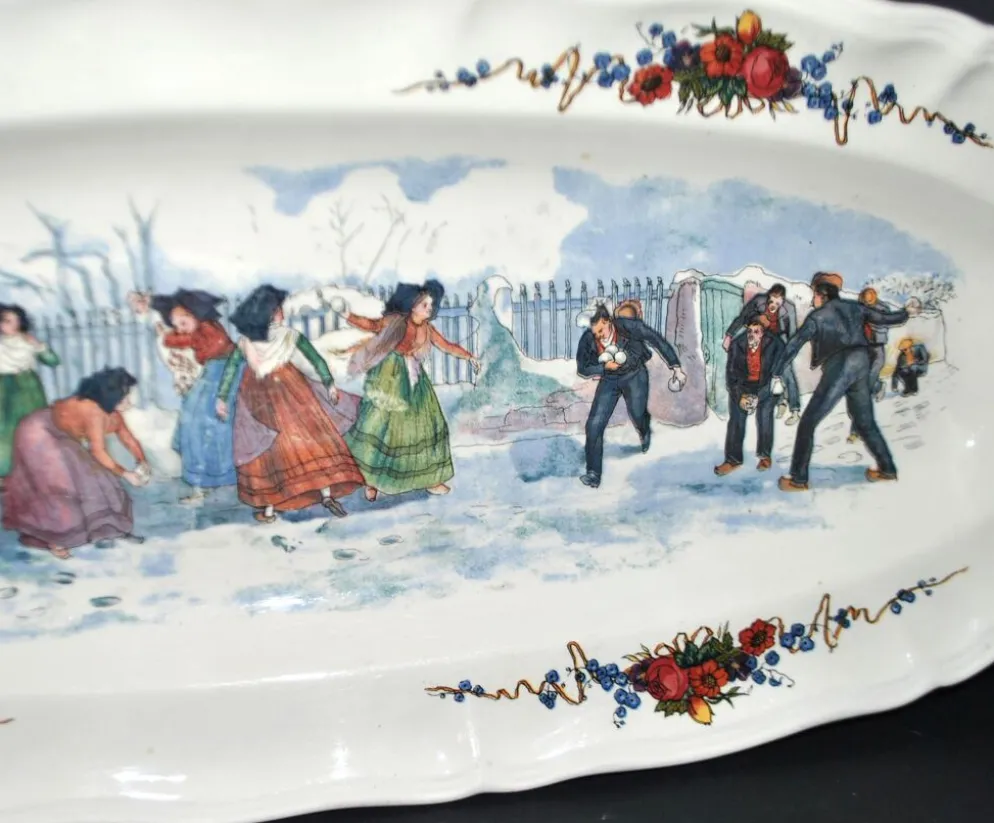 Sarreguemines grand plat ovale Obernai la bataille de boule de neige H. Loux