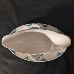 Sauciere xixème en faïence, estampillée lille k&g luneville