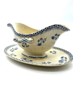 Saucière blanche et bleu en faience terre de fer Boch Frère model Astre