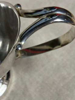 Saucière et sa cuillère en métal argenté
