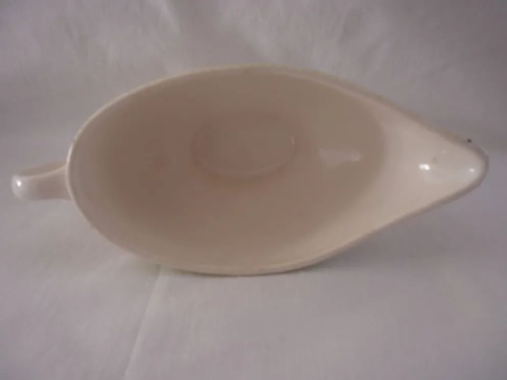 Saucière porcelaine de Salins