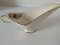 Saucière Salins France décor floral stylisé