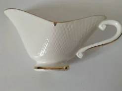 Saucière Salins France décor floral stylisé