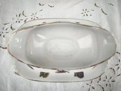 Saucière sur dormant en porcelaine de Limoges décor panier d'hortensias