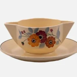 Saucière vintage en céramique Saint-Amand crème et à motifs fleuris