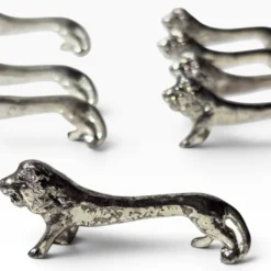 Series of antique knife rests in the shape of a lion, silver-plated metal.